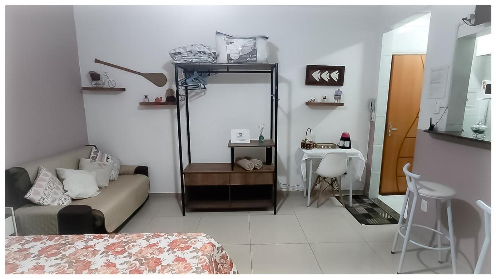 Апартаменты Residencial Kit Da Praia Сантос Номер фото