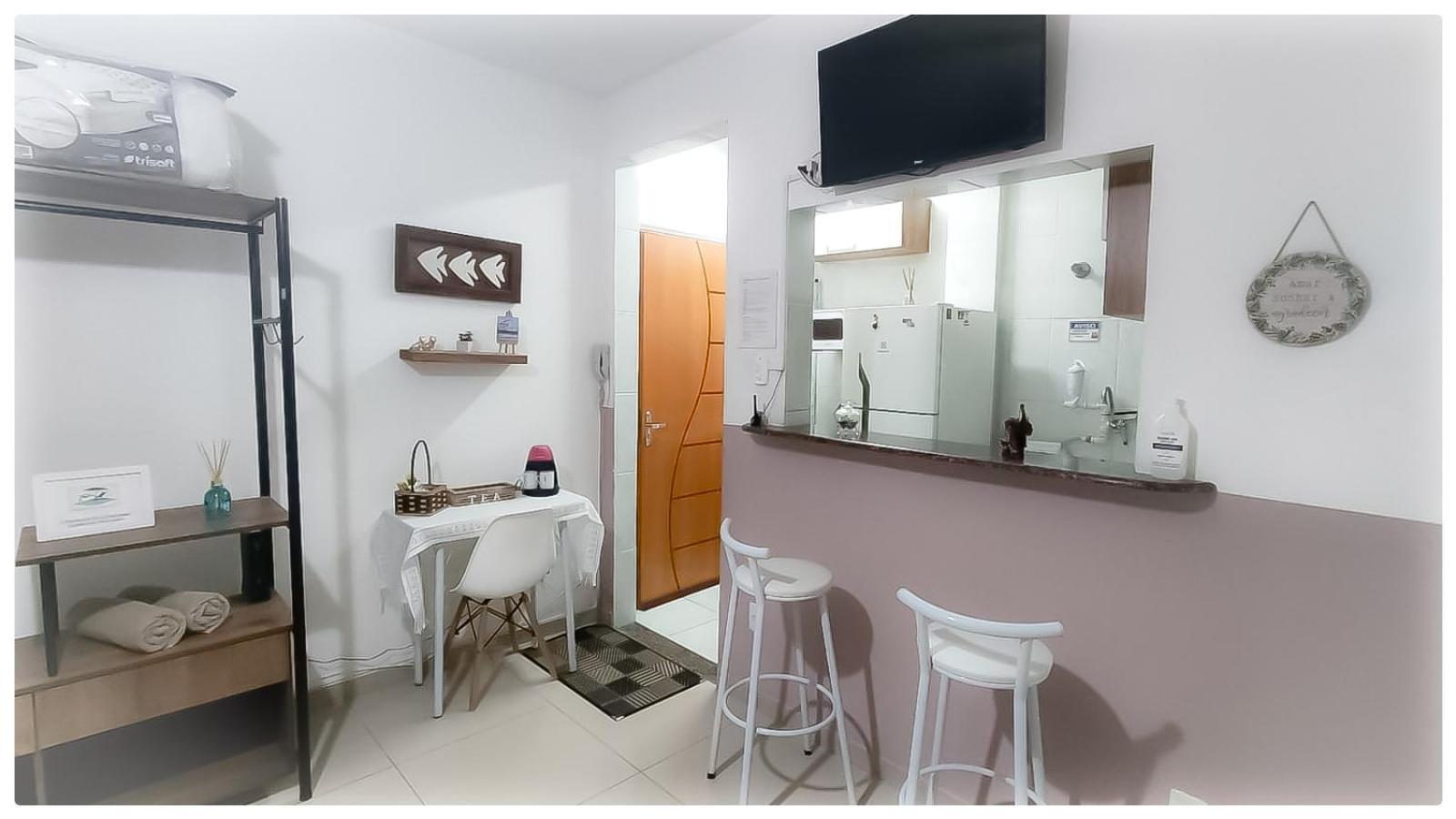 Апартаменты Residencial Kit Da Praia Сантос Номер фото